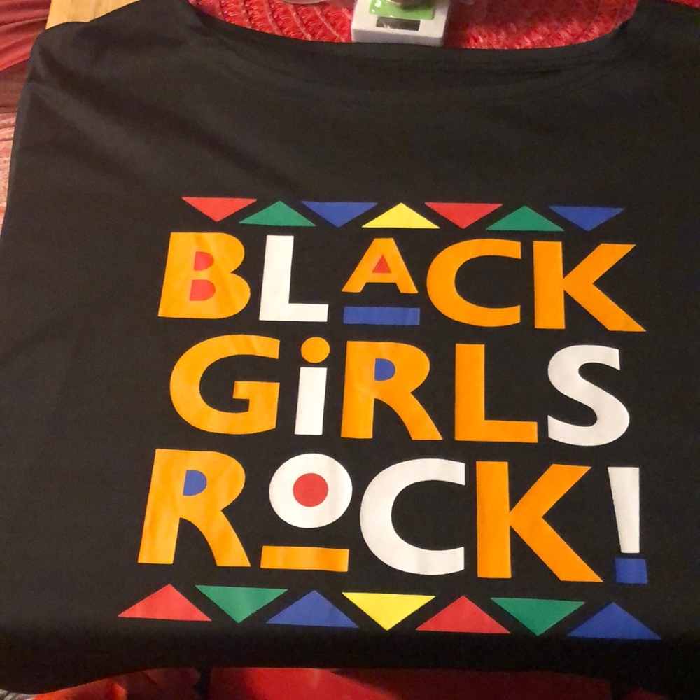 Black girls rock set orange size (says 3x) more like size Med to large